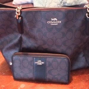 Coach tote and matching wallet.